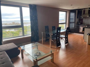 Modern 2 bed apartment with stunning seaside view